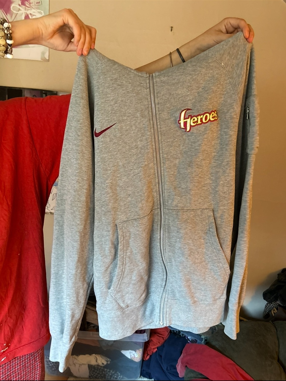 Nike Light Gray Full-Zip Hoodie with Maroon Swoosh and Yellow-Outlined Patch